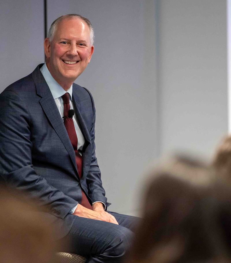 Peter Zaffino speaking to croud of people